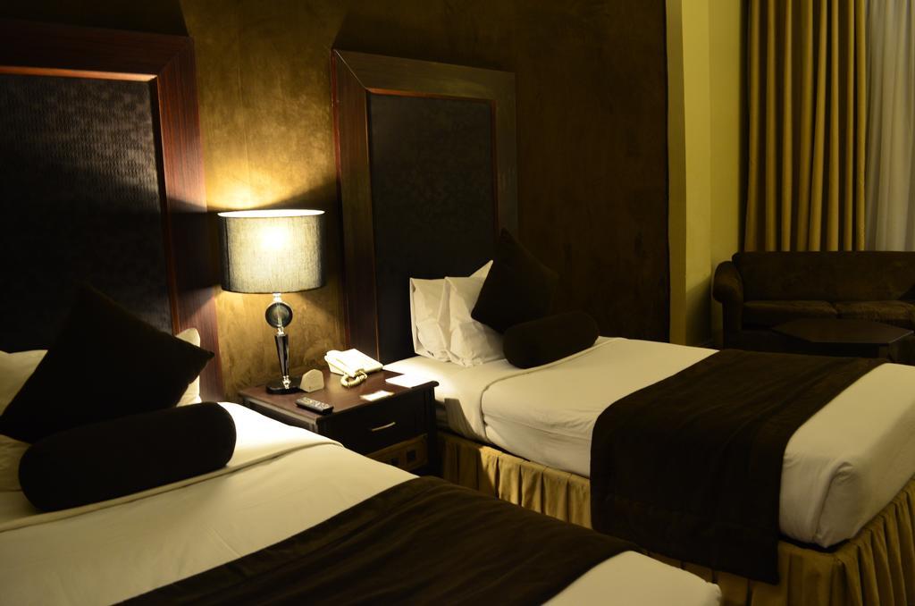 Smart Hotel Lahore Værelse billede