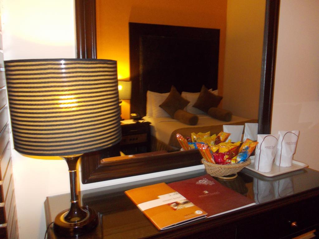 Smart Hotel Lahore Værelse billede